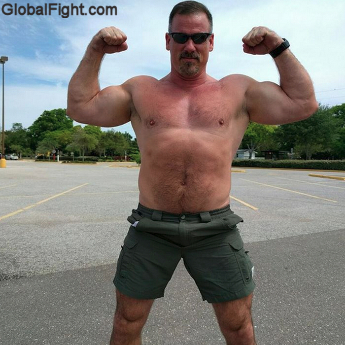 hairy blokes flexing hard.jpg