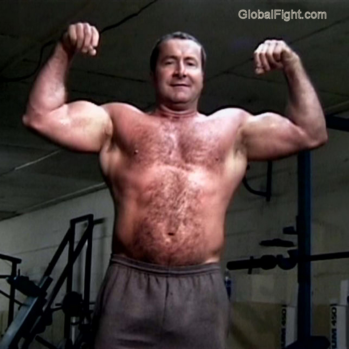 handsome redneck flexing arms.jpg