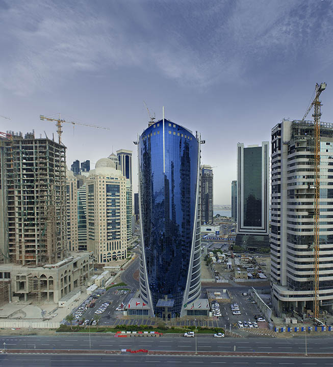 The daytime view shows interesting surrounding buildings