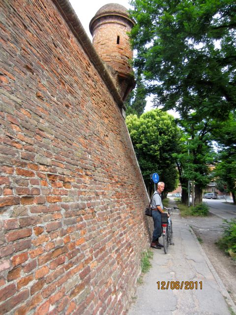 Ferrara,   Philip and bicycle by the ancient city walls
