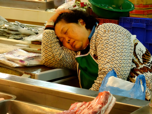 Sleepy market vendor