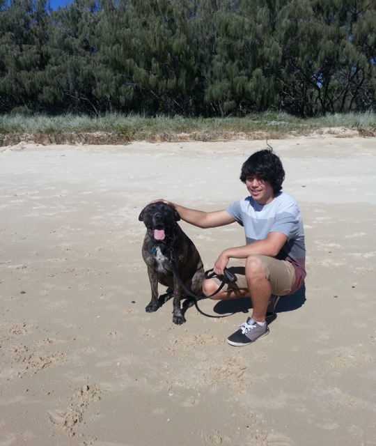 Boy and dog on Kawana beach