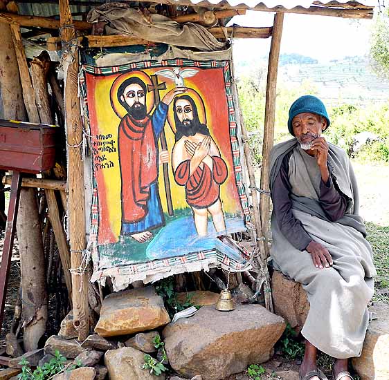 Priest collecting money for the renovation of a church near Gondar. Ethiopia.