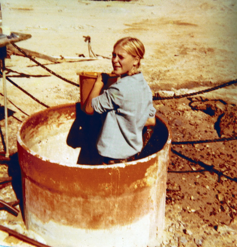 Marta cleaning the rinse tank