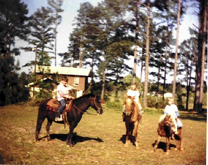 PATRICK ON HIS HORSE BANNER WITH RANDY  JORDAN.JPG