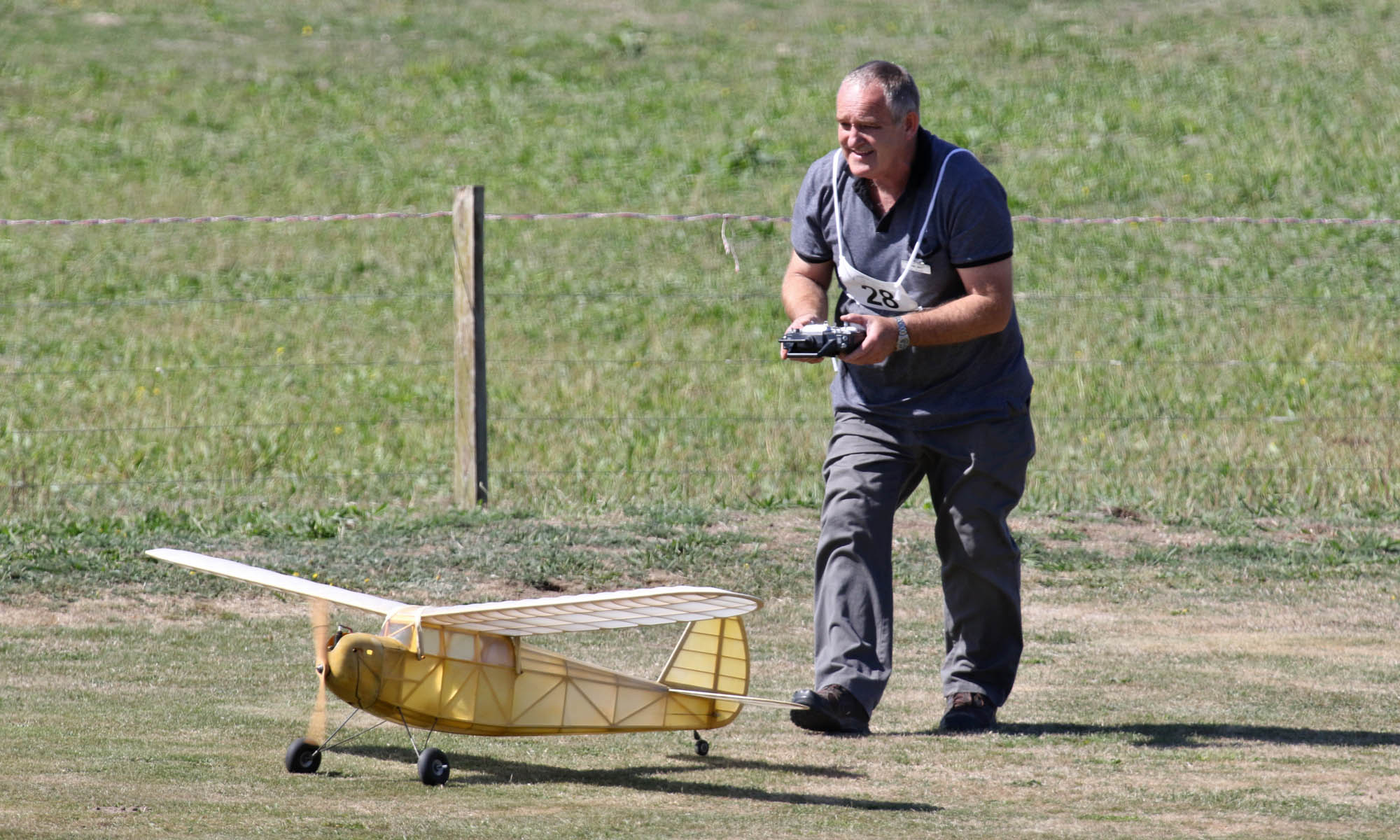 Ian Munro coaxing his Brown Jnr engined plane to take off, 0T8A8683.jpg