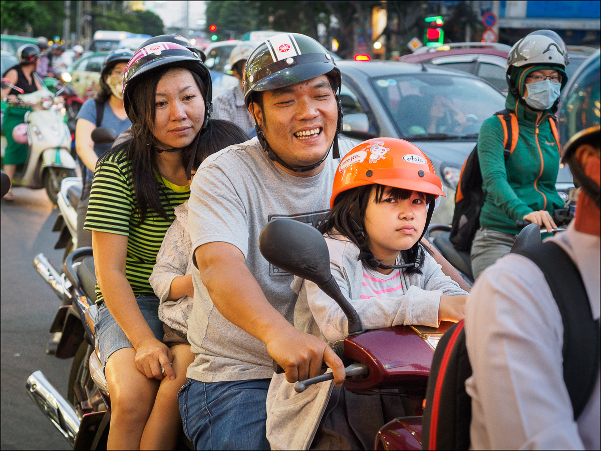 Family of four on a motorbike, Saigon