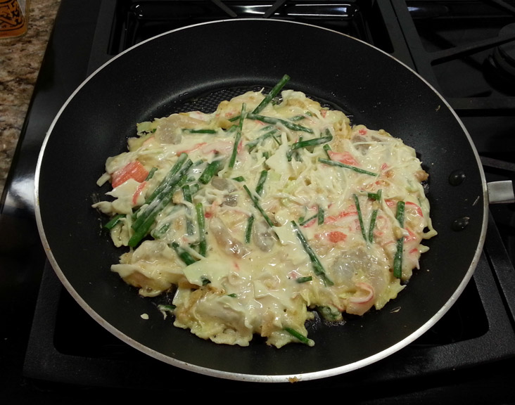 20130623_120826 Okonomiyaki just placed in skillet...