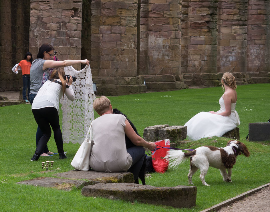 SIL10399 Photographer at work at Fountains Abbey