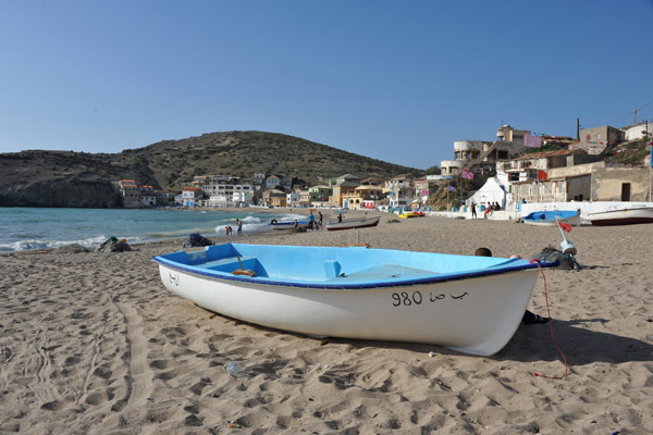 Small boat on the beach at Bouzedjar