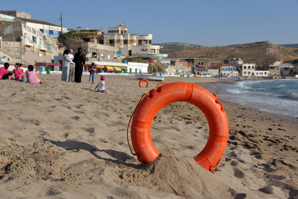 The guarded section of beach is marked out by rings for swimmers