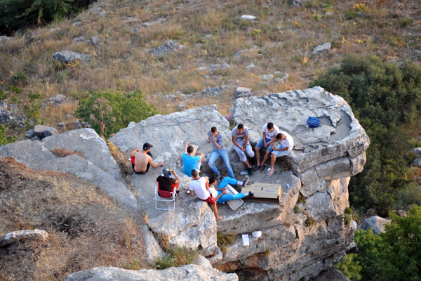 Algerians chilling out on the cliffs at sunset