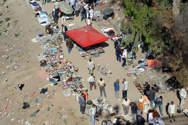 Flea market set up beneath the approach to the Sidi Rashid Bridge