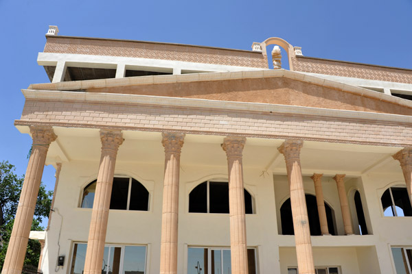 A modern building in the classical style greets you on arrival at Timgad