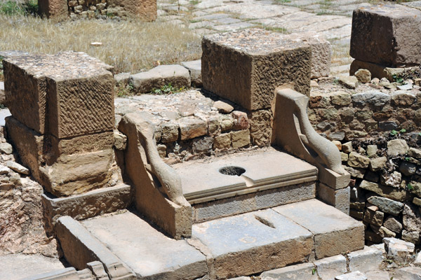 Public latrine with sit-down toilets, a technology lost for centuries - and still not found in many countries today