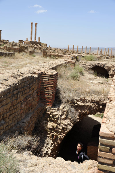 Zacharia explores the lower level of the ancient baths
