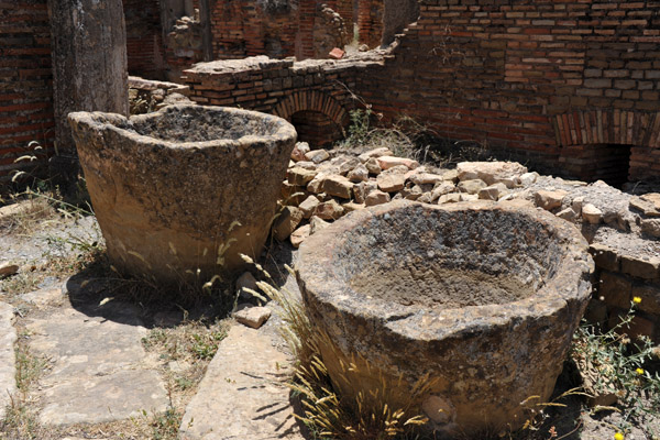 Carved stone vessels abandoned at the Grand South Baths