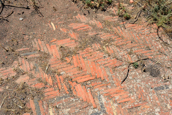 Herringbone pattern brickwork on the floor of a ruined building inside the Byzantine Fort, Timgad