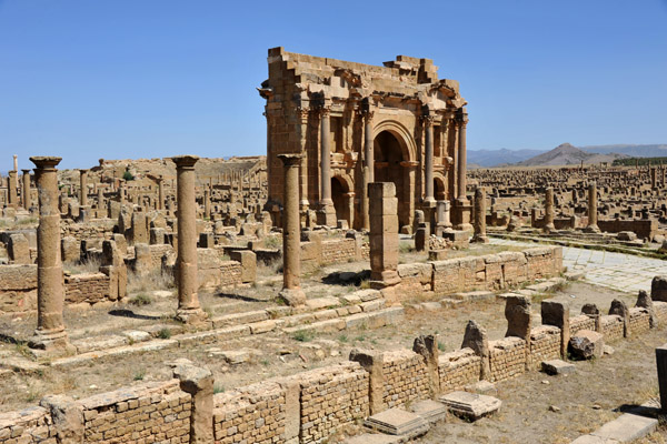 Roman road leading up to Trajan's Arch from the western temple, Timgad