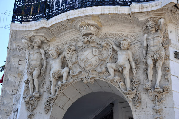 Sculptural detail of a building overlooking Place des Martyrs