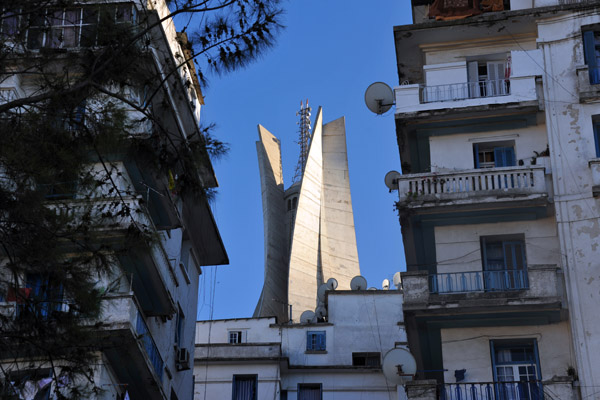Martyr's Monument between apartment towers