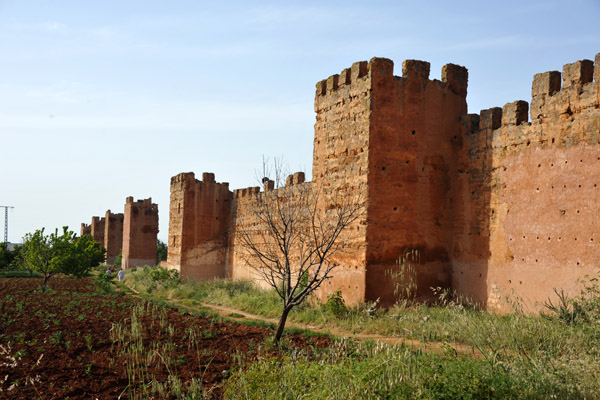 Walls of Mansourah, now surrounded by farmer's fields and bisected by the modern road