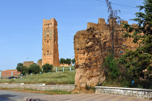 Minaret of Mansourah seen through a gap in the city walls