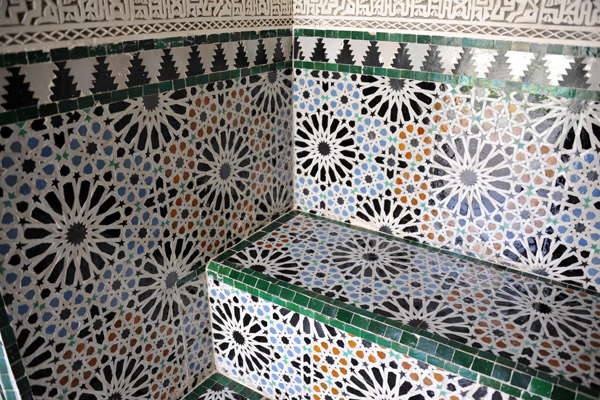 Bench in a niche covered in zellige tile, Mechouar Palace