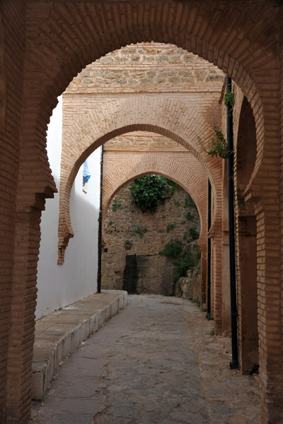Arches along the lane around the Mosque of Sidi Boumedienen