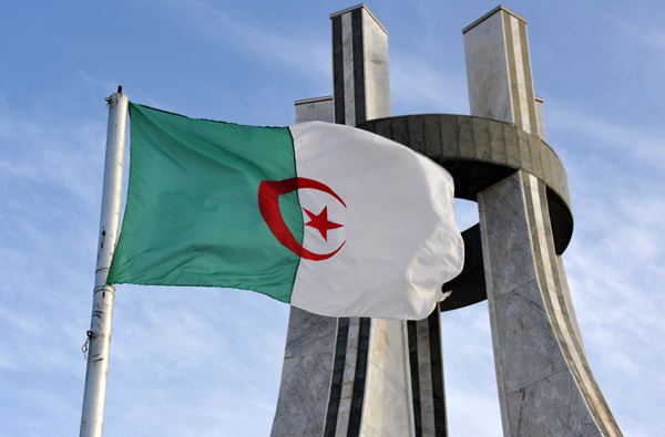 Algerian flag with the Lalla Setti Martyrs' Memorial, Lalla Setti