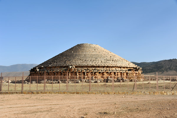 The monument is 58.86m in diameter and 18.5 m tall