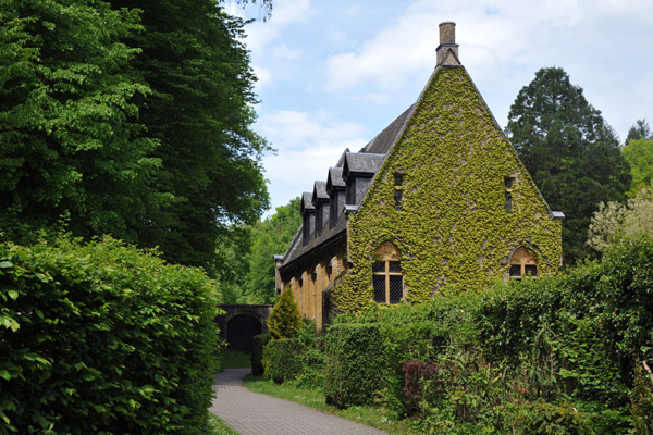 Ivy-covered building on the grounds of Orval Abbey
