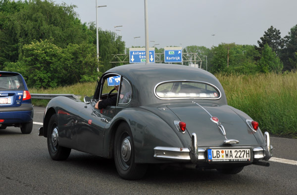 Classic Jaguar with German plates driving through Belgium