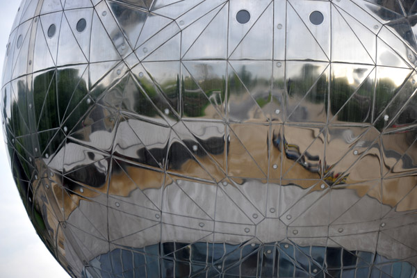 Expo 58 grounds reflected in the central sphere of the Atomium