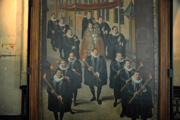 Painting of a torchlit procession in Bruges
