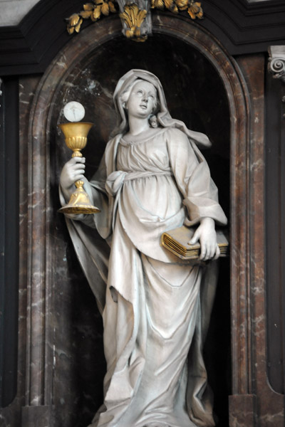 Sculpture on the left side of the Madonna of Bruges