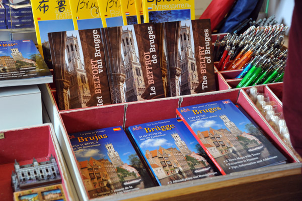 Multilingual souvenir books of Bruges on sale at the Belfort