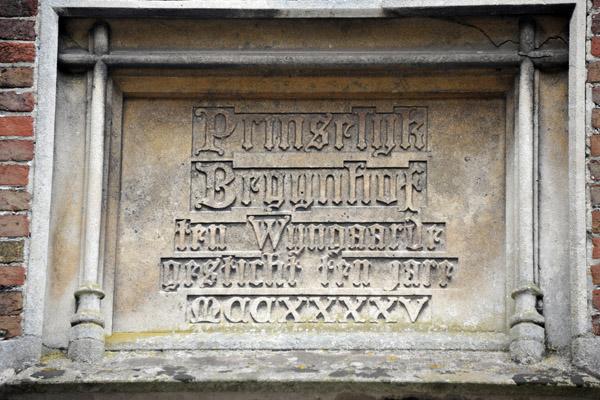 Dedication plaque with the date of foundation of the Begijnhof in 1245, Bruges