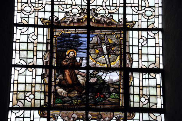 Stained glass window in the chapel of the Begijnhof, Brugge