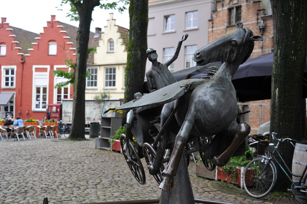 Sculpture of horse and carriage carrying an angel, Walplein, Bruges