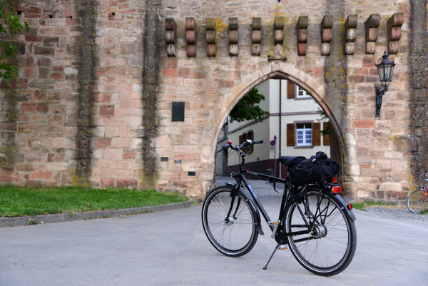 The bike in front of the Schloßberg Gate