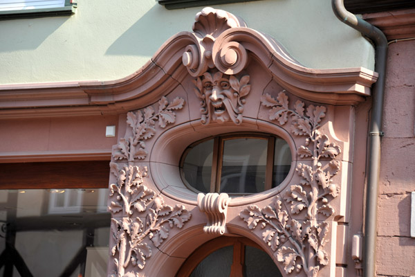 Oval window in carved red standstone, Miltenberg