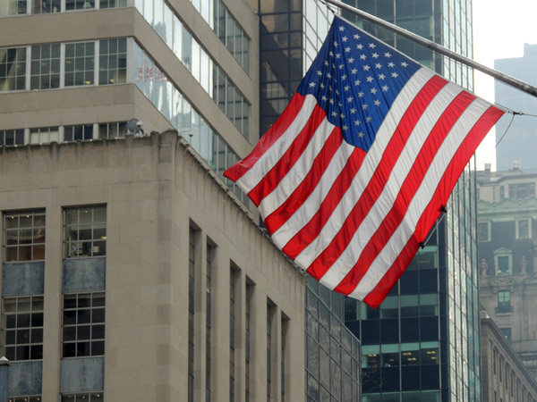American Flag flying over 5th Avenue