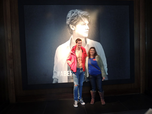 Abercrombie & Fitch model in front of the 5th Avenue store