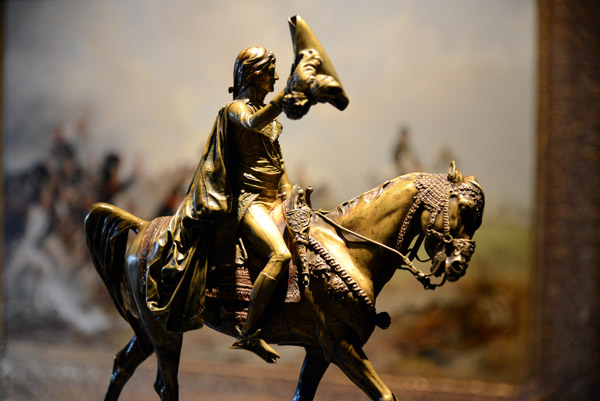 Small bronze of Napolon riding