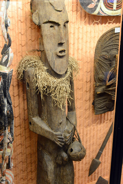 Figure of a man - portion of wooden style at home entrance, Namatana Island, Fiji