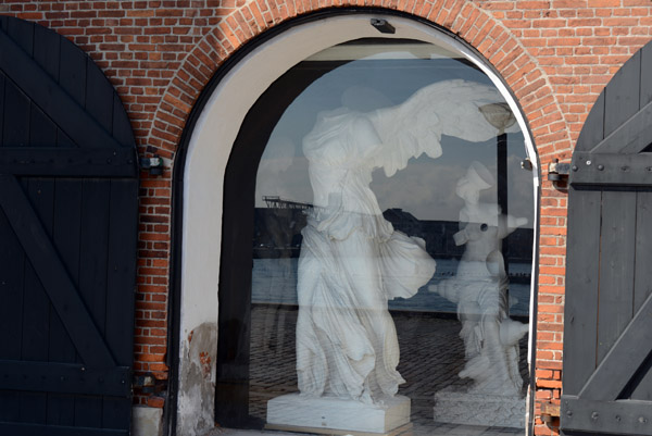 Winged Victory of Samothrace in a window of the Royal Casts Collection, Copenhagen