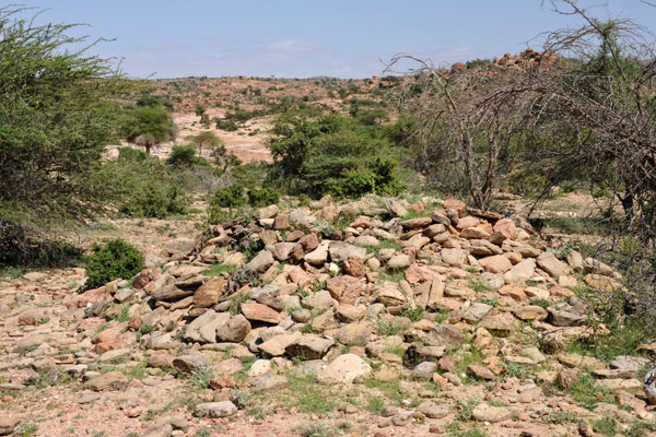 Pile of rocks at the base of Laas Geel, probably an ancient tomb
