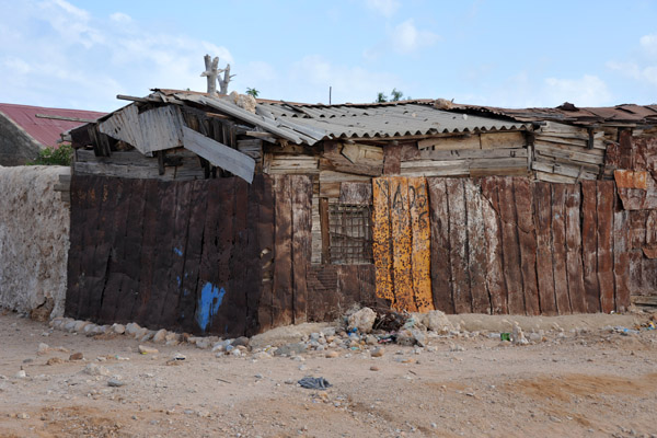 Shack of wooden planks and rusted sheet metal, Berbera