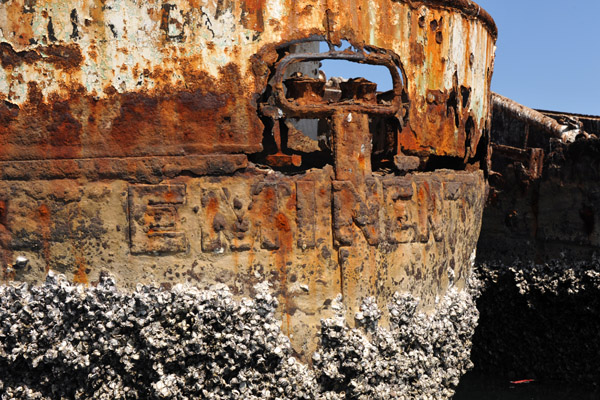 Rusted over lettering of the ship's name EMINENT